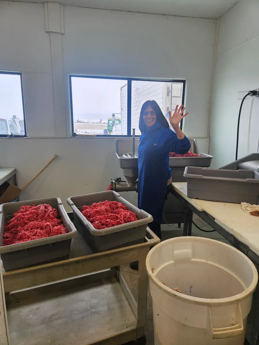 Mia Larson grinding beef at H&M Custom Meat