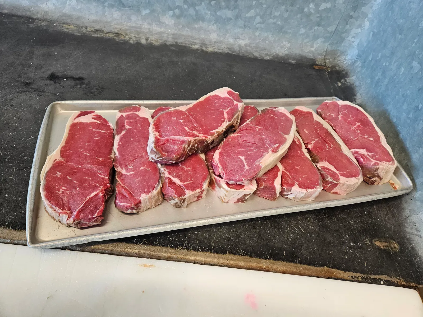 Assortment of premium steaks including ribeyes and strips from H&M Custom Meat, Creston WA